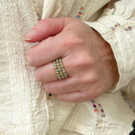 Close-up of hand wearing the affordable Leopoldine Celestine ring in green jade — a stylish beaded statement ring perfect for stacking or gifting in the UK.