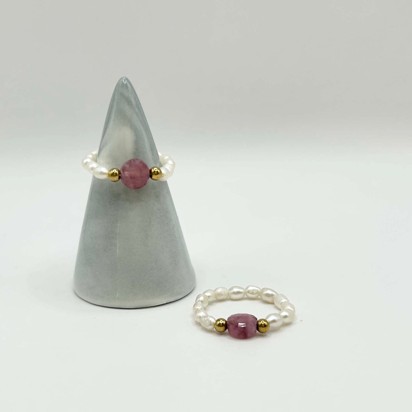 Delicate pink tourmaline and freshwater pearl ring set – dainty beaded jewellery with gold accents, feminine stacking rings. Elegant gift idea, UK jewellery label.