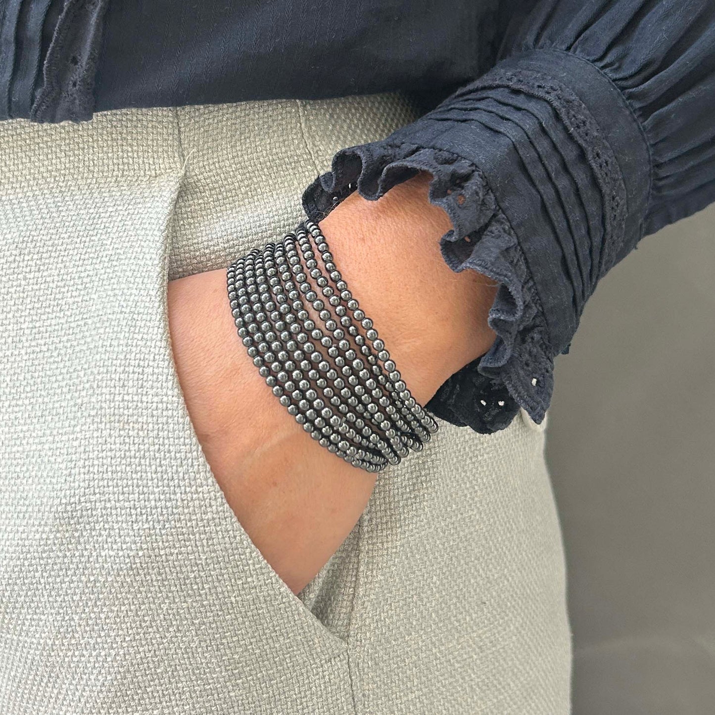 Sleek hematite bracelet stack – bold multi-strand metallic wristwear for modern UK styling.