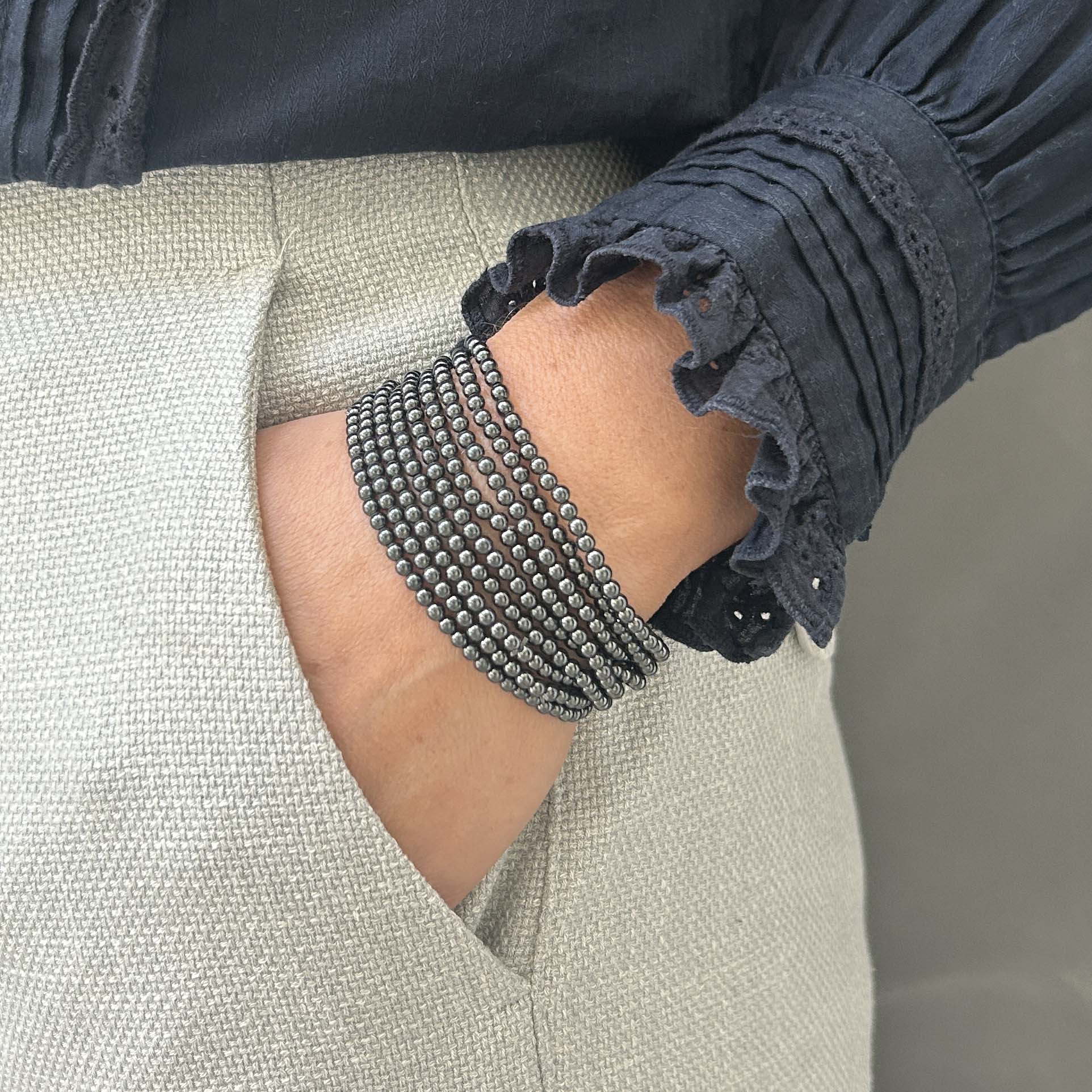 Sleek hematite bracelet stack – bold multi-strand metallic wristwear for modern UK styling.