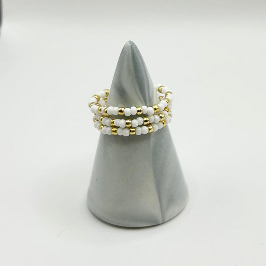 Set of three Leopoldine Confettis rings in white and gold glass beads, stackable fashion jewellery under £10 UK.