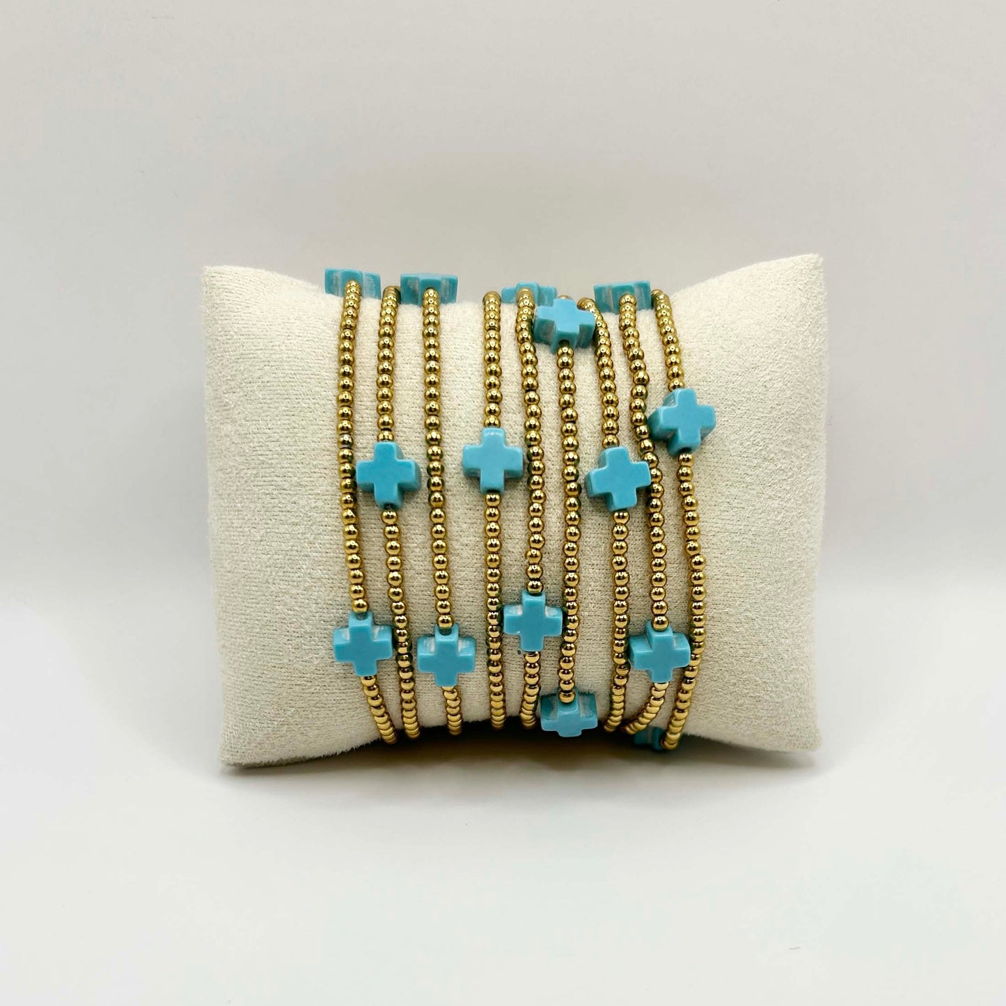 Leopoldine Divine bracelet with nine turquoise crosses – vibrant boho stacking bracelet with golden beads, cheerful and stylish accessory for women or teens.