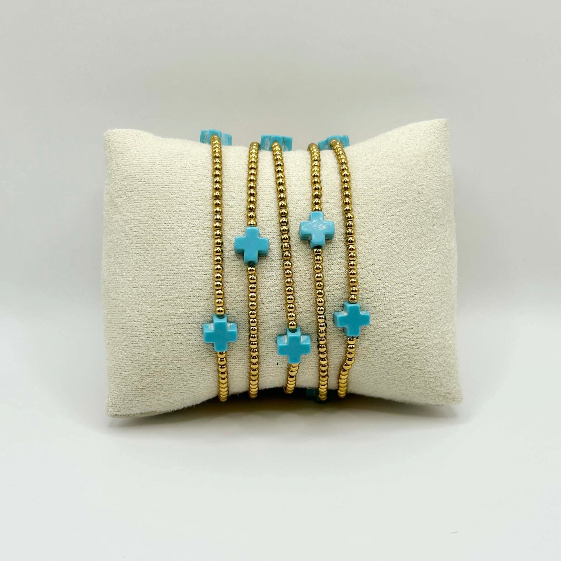 Five turquoise cross bracelet by Leopoldine Divine – bold, joyful stacking bracelet with golden beads, playful and symbolic, perfect gift under £50 for her or teens.